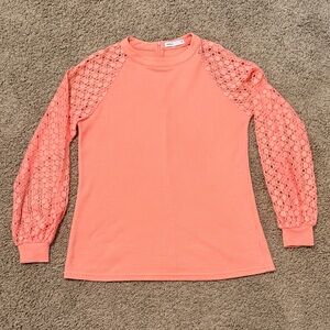 Elegant Coral Top with Lace Detail